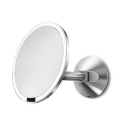 Simple human sensor mirror. 8” wall Mount. New open box. 5x magnify. Brushed finish. Tri-lux: stimulates natural light. MSRP: $230. Our price: $140 + 