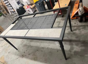 Outdoor patio table with umbrella hole