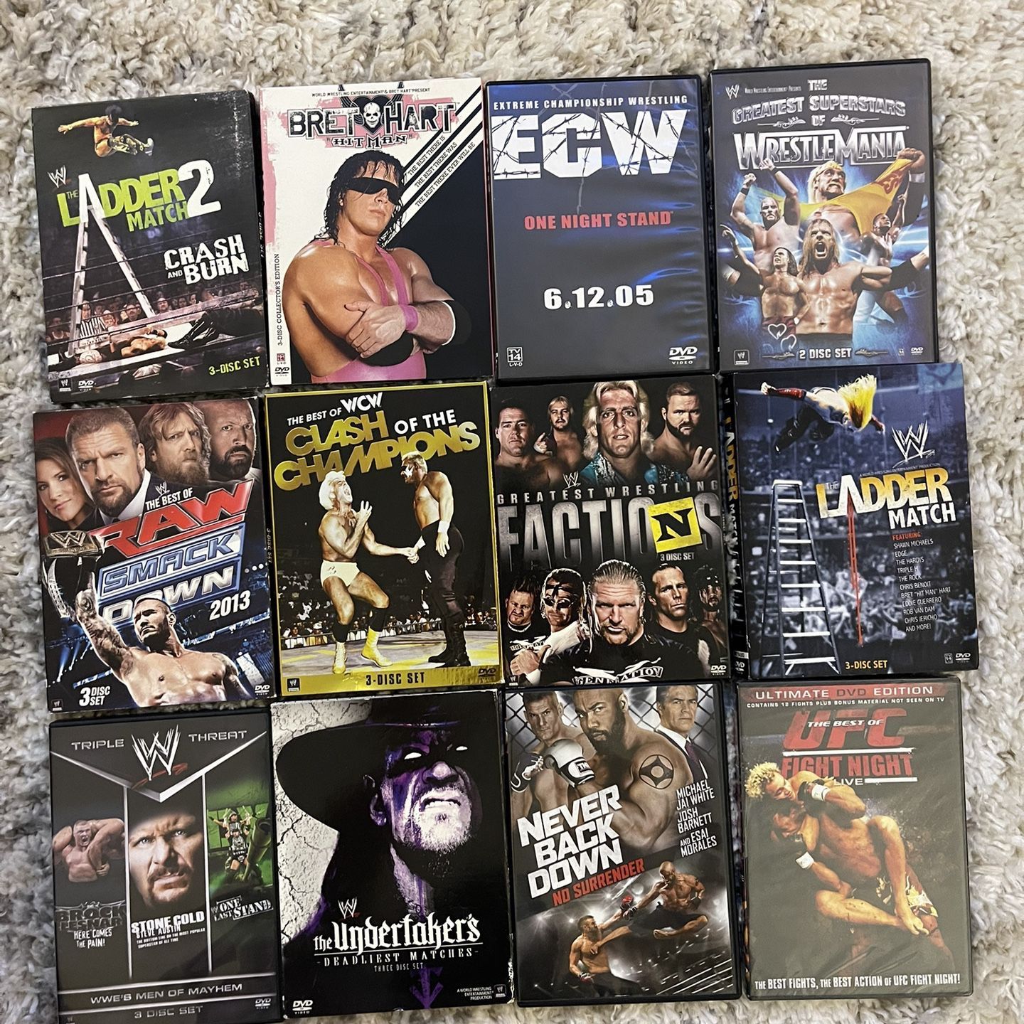12 Wrestling UFC WCW WWE WWF DVDs Bundle for Sale in Hauppauge, NY