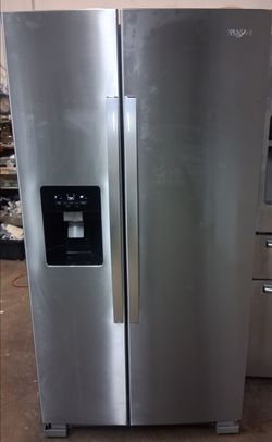 Whirlpool 26 cubic foot side by side refrigerator with water and ice through the door