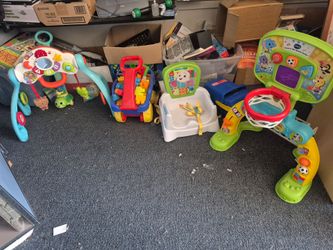 collection of infant and toddler activity toys