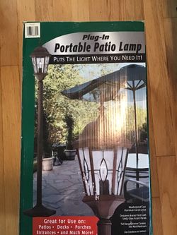 New in box outdoor plug-in (not solar) lamp And The posts lighting Qty 2 Avail 