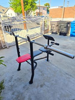 Weider Weight Bench with Barbell