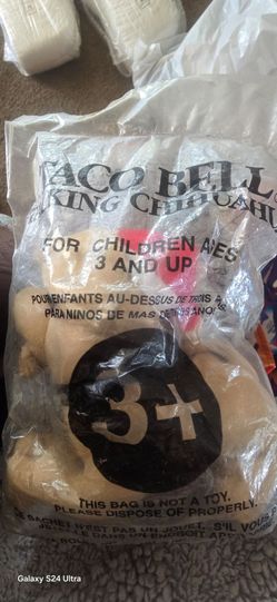 vintage, unopened 1998 Taco Bell Talking Chihuahua plush toy sealed.