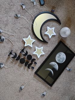 Moon mirror, lights, candle holders, framed picture