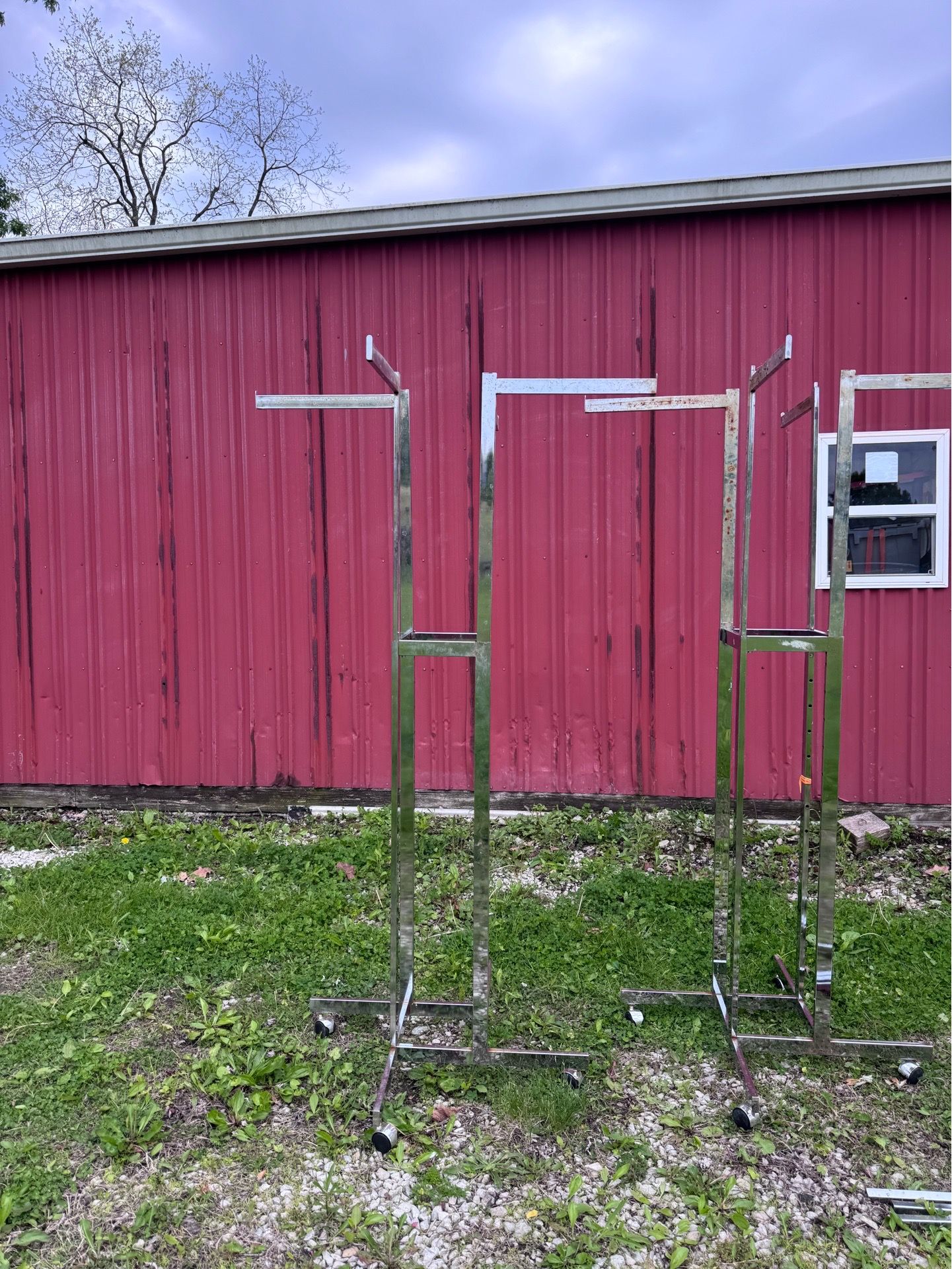Two rectangle clothing racks