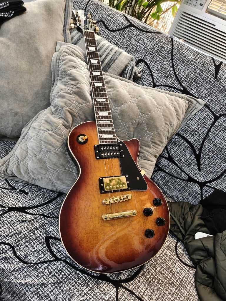 Firefly Tabaco Birdseye Sunburst Electric Guitar .