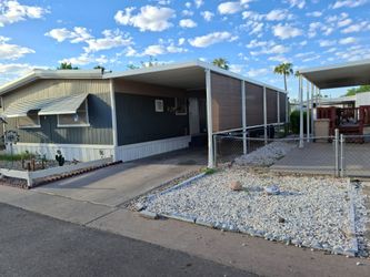 Mobile Home with Carport and Covered Patio