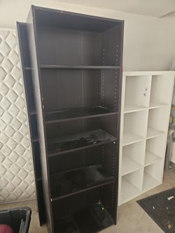 3 black shelves