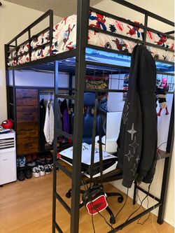 Twin bed with closet and desk