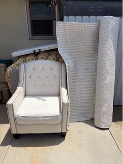 2 matching chairs and rug.