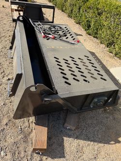 Rock rake hydraulic for skid steer
