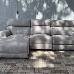 Newport 3-Piece Dual-Power Reclining Sectional with Chaise lounge. Like new.I can deliver for a cost. Dimensions: 119"W x 64"D x 40"H. 