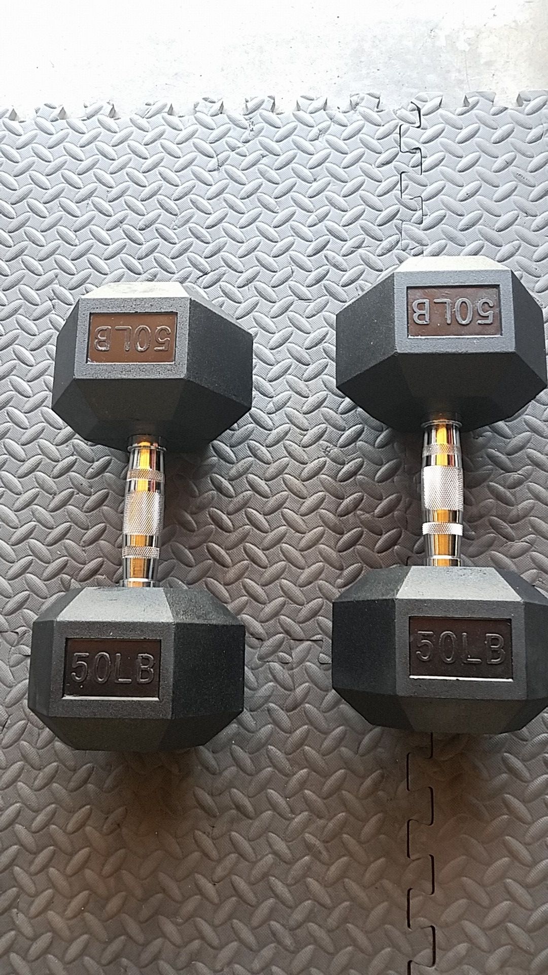 Pair 50lbs dumbbells rubber hex