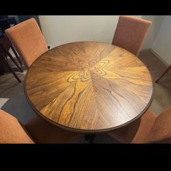 Round dining table with chairs