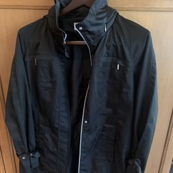 Calvin Klein Large  Women’s Rain Jacket🖤 Black  Front Zip and Snap  Closure   4 Zip Pockets    Worn Few Times    32” Length     Excellent 