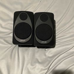 Two Polk Audio Speakers
