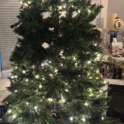 tree 7 1/2 feet one section of the lights are out NO TREE STAND
