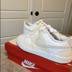 Nike Court Vision Low white trainers.