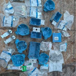 Misc home electrical supplies, pipe clamps , cable connectors