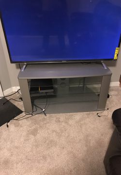 Tv stand natural gray,holds 55 inch tv as shown
