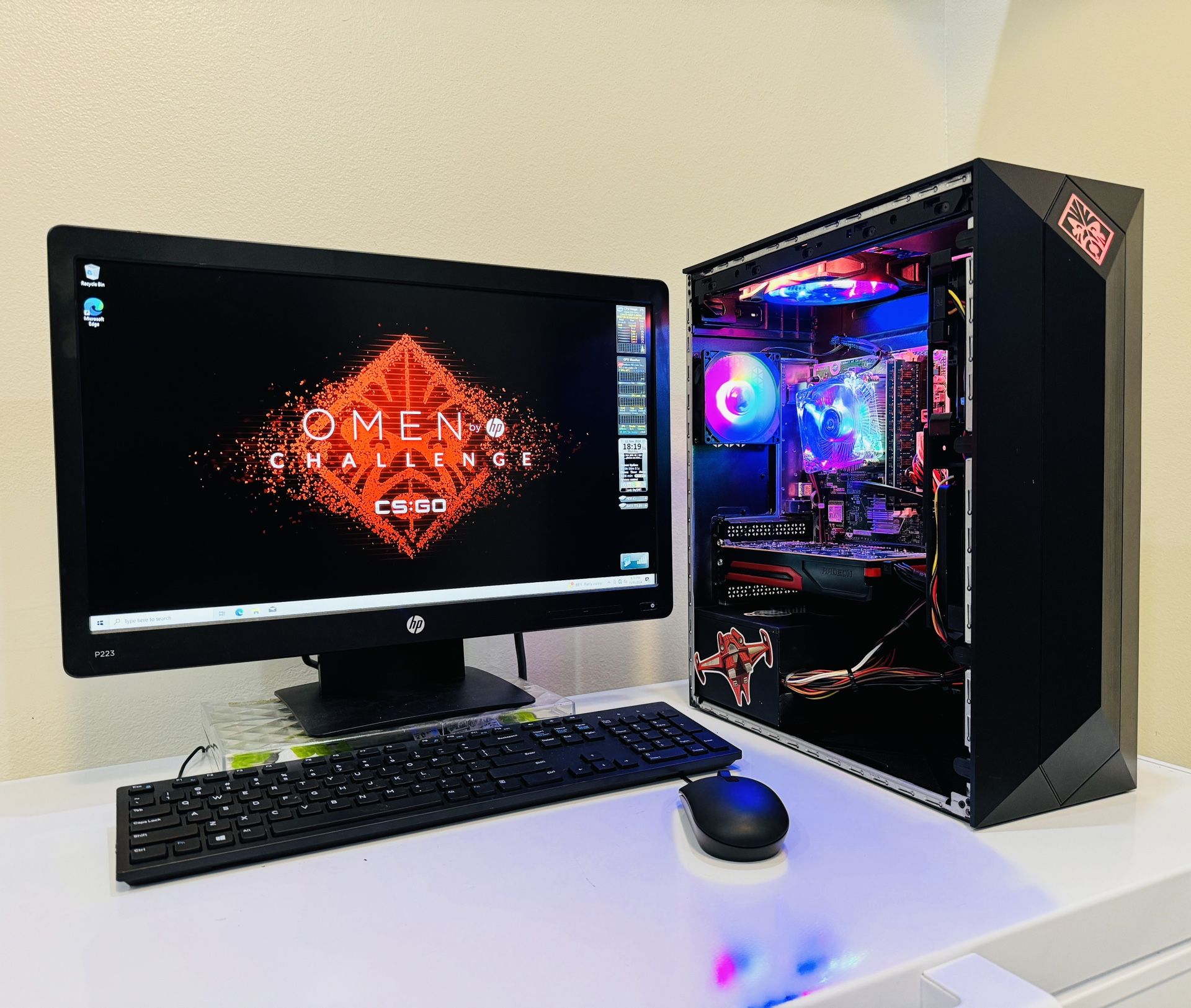 HP OMEN Gaming PC 4 Core I5 @ 2,0 GHz. GPU AMD HD 7770 128GB SSD/ 1TB HDD, 8GB RAM. WIFI. Bluetooth. USB.3.0. 500W PSU. 22” Monit/Keyb,Mouse. Win10
