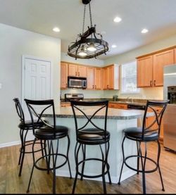 Set of 4 Wrought Iron designed Swivel Bar Stools - Bar Height (28")