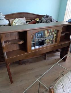 Wooden headboard with mirror