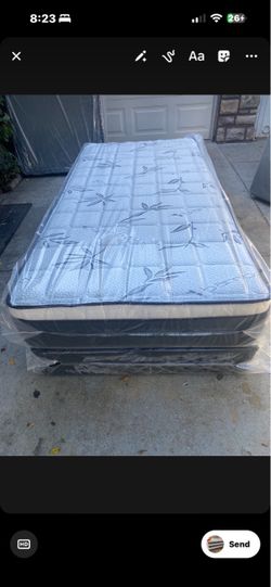 NEW TWIN IN PLASTIC MATTRESS !!!