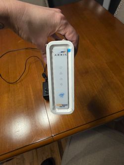 Arris surfboard modem