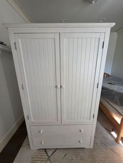 Charming white wardrobe armoire