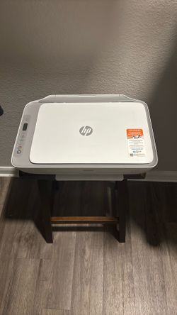 white HP DeskJet 2755e All-in-One Printer.