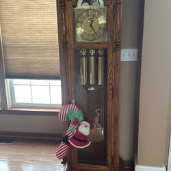 Beautiful Howard miller Grandfather Clock