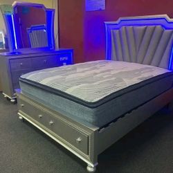 Queen-size bed with drawers and lights. Ask for price. 
