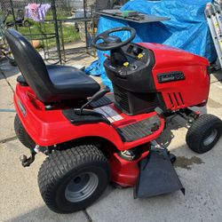 Red ride lawnmower