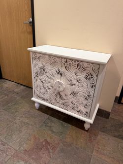 Distressed White Carved 2-Door Accent Cabinet | Pickup Only