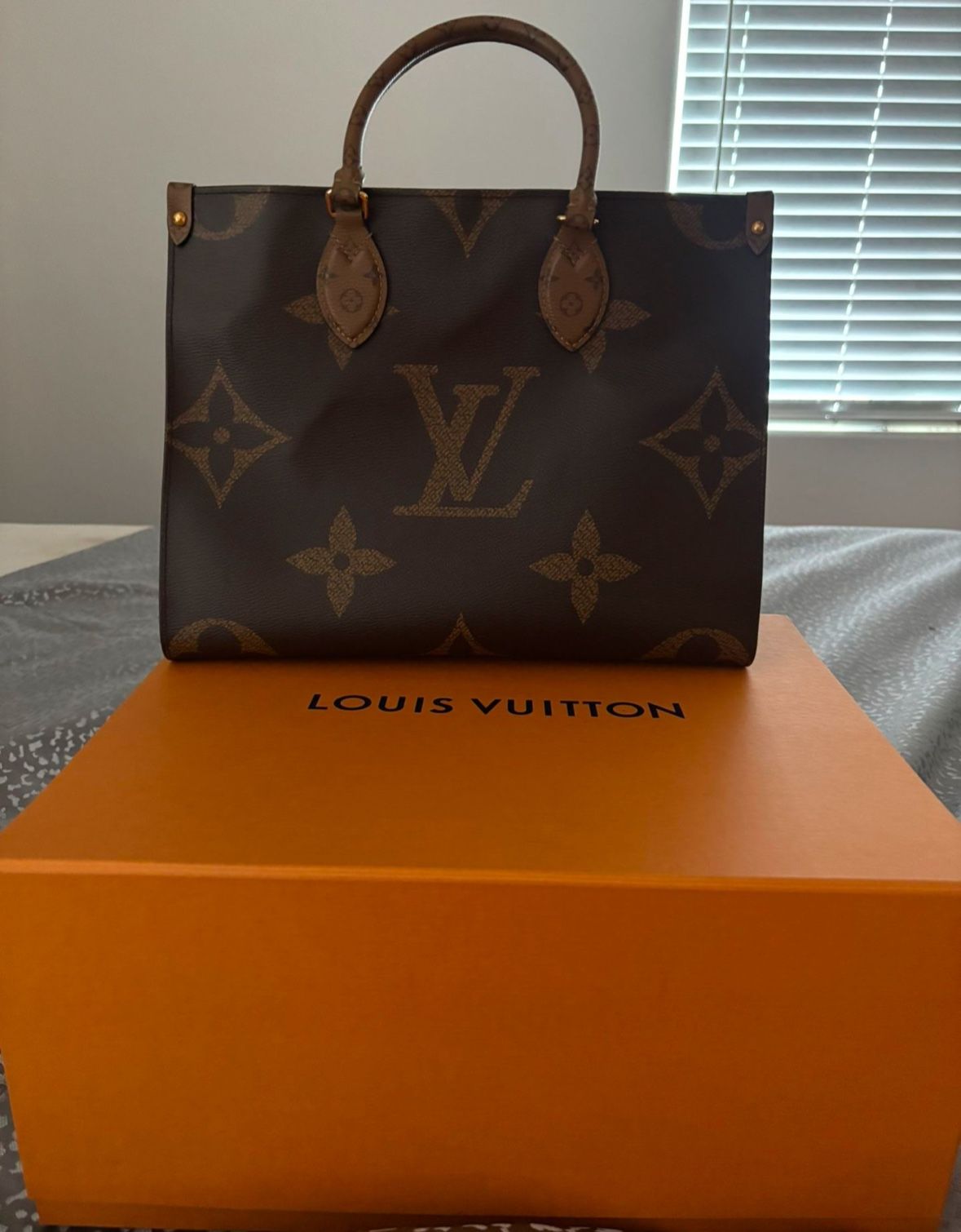 Louis Vuitton On The Go Bag