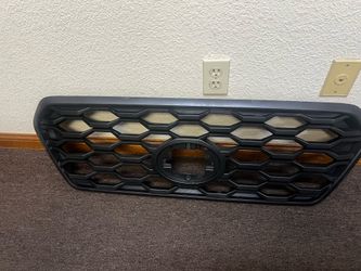 2019 Toyota Tacoma grille, front upper grille, front side fender flare, Ac condenser, radiator fan shroud