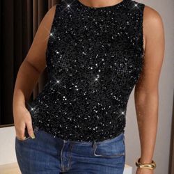 Black sequin top with sparkly details.