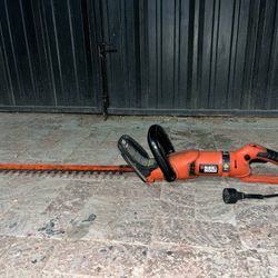 Black+Decker 24 in. 3.3 Amp Corded Dual Action Electric Hedge Hog Trimmer