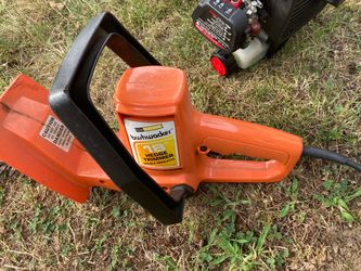 Working hedge trimmer. electric