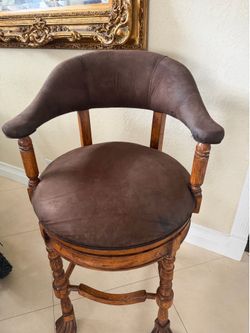 Two (2) large swivel bar stools