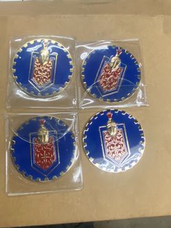 Set 4 Chevy Montecarlo knockoff medallion, NEW, sell all 4 for $120.00 cash