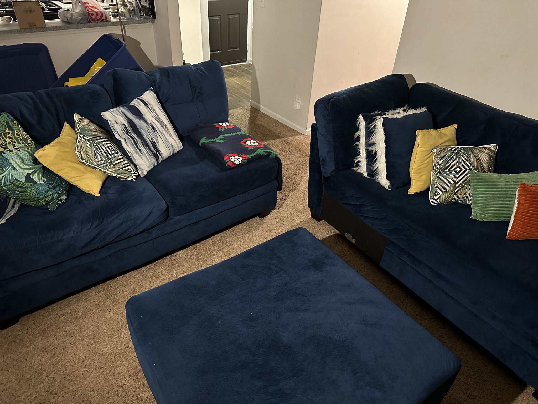 NAVY BLUE SECTIONAL COUCH AND OTTOMAN