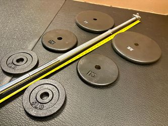 Standard 6 ft Gently Used Bar ( Split in 2 pieces) with pair of Cast Iron Plates of 25#, 10# and 5 pounders. Brute Weight: 100 #
