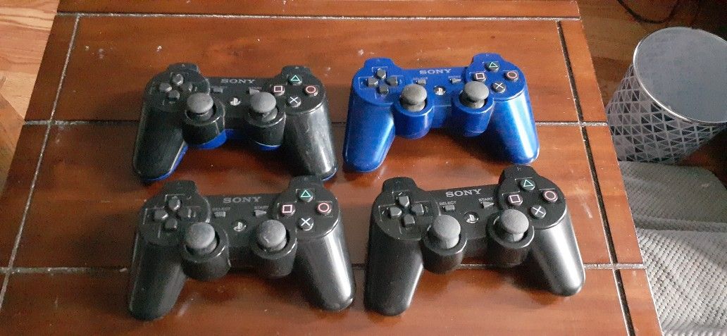 PS3 CONTROLLERS AND GAMES CONTROLLERS $15 EACH GAMES $25 FOR ALL 5
