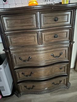 Tall Dark Wood Chest of Drawers