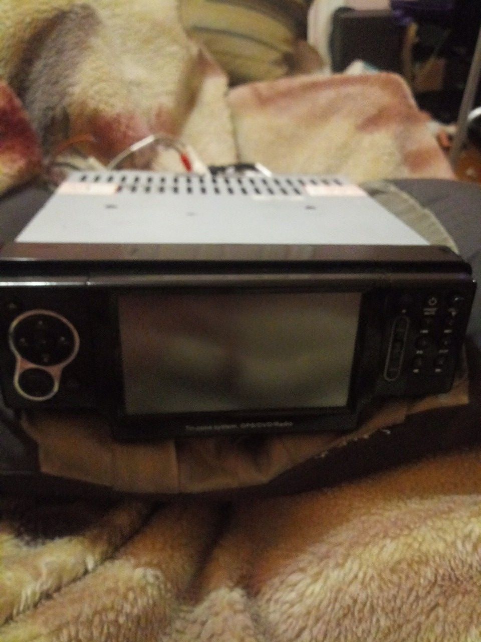 Tri-Zone System With Gps/Dvd/Radio And It Has A Camera. Tv Screen