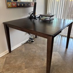Bar height dining table