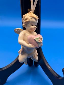 Hanging Angel ornament holding pink heart